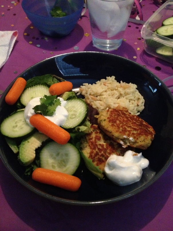 Some homemade falafel with whole grain rice, a salad and some plain Greek yogurt. Very tasty and wonderful colors to boot.