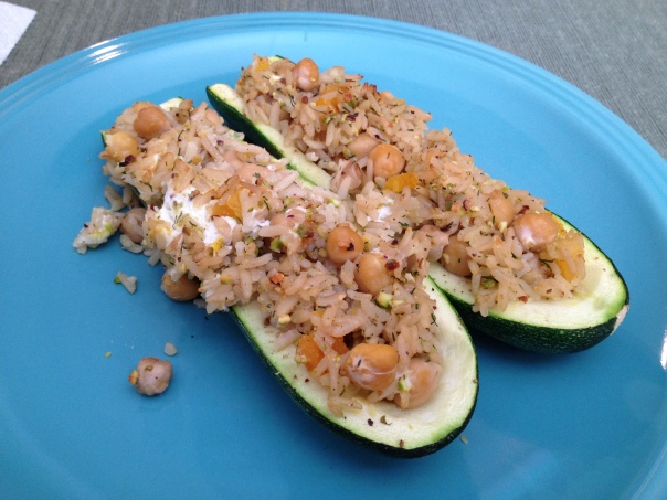 Grilled zucchini stuffed with whole grain rice, apricots, and chick peas, with just a smidge of goat cheese to bind it all together. 
